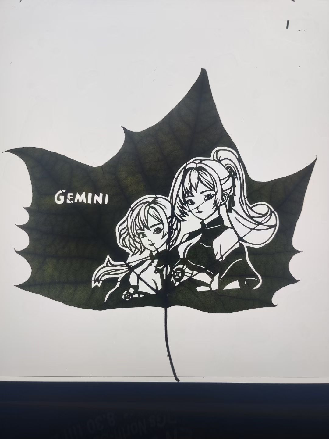 Gemini Anime Leaf Carving – Dual Character Zodiac Art on Real Leaf