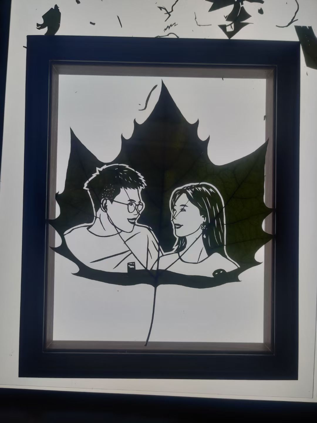 Custom Couple Portrait Leaf Carving – Framed Handcrafted Memory Art