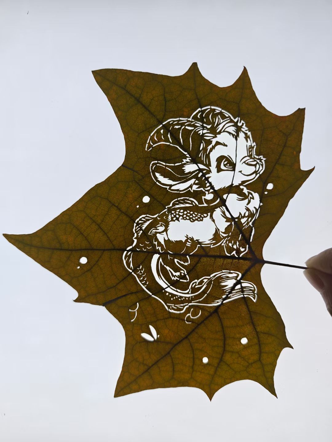 Hand-Carved Leaf Art - Cute Chinese Qilin Decor Ornament
